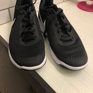 Black and white Nike sneakers used twice.